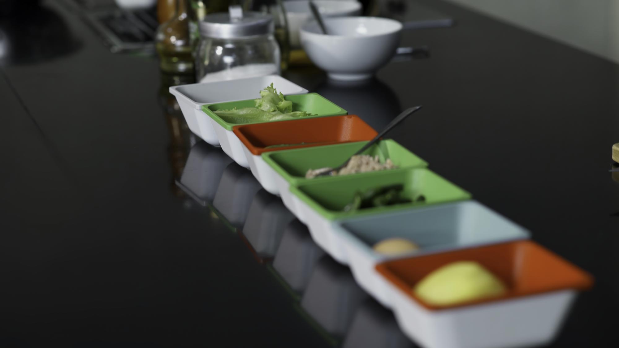Tools and labeled ingredient trays in sterile layout